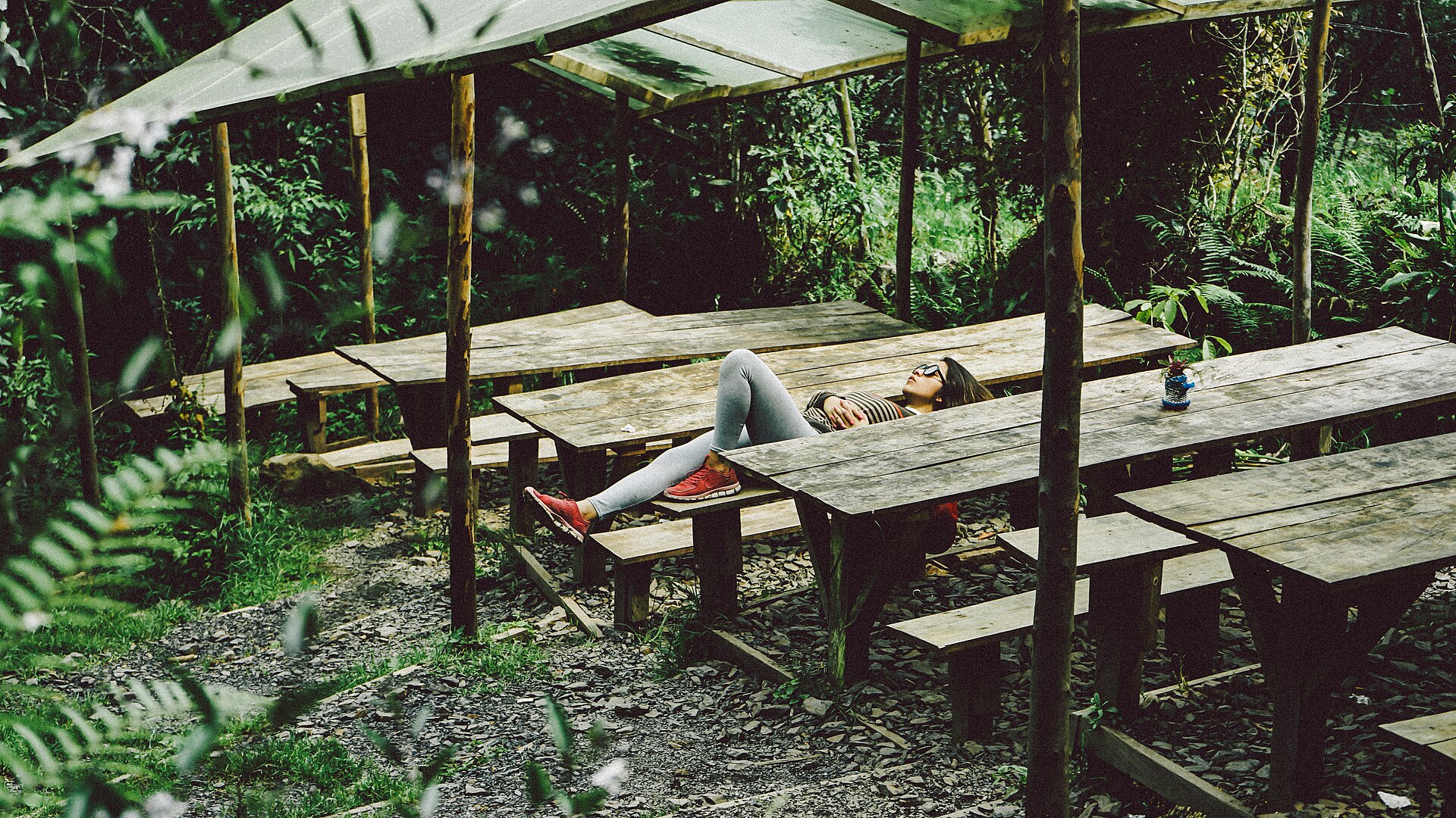 Woman relaxing outdoors away from digital screens